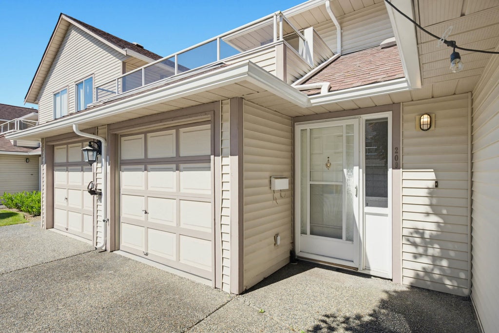 Photo of 13725 72a Avenue #209, Surrey, BC V3W 0S4 (MLS # R3132291)
