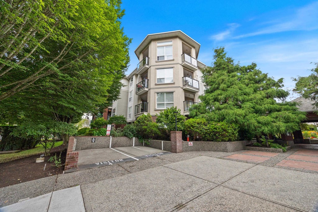 Photo of 20239 Michaud Crescent #106, Langley, BC V3A 8L1 (MLS # R3162770)