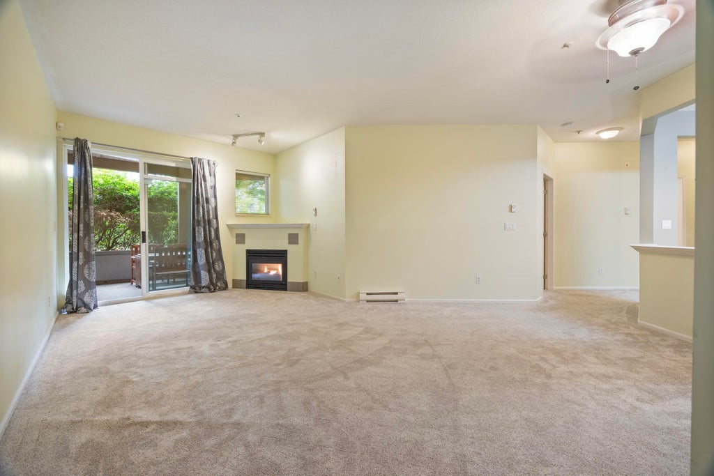Photo of 20239 Michaud Crescent #106, Langley, BC V3A 8L1 (MLS # R3162770)