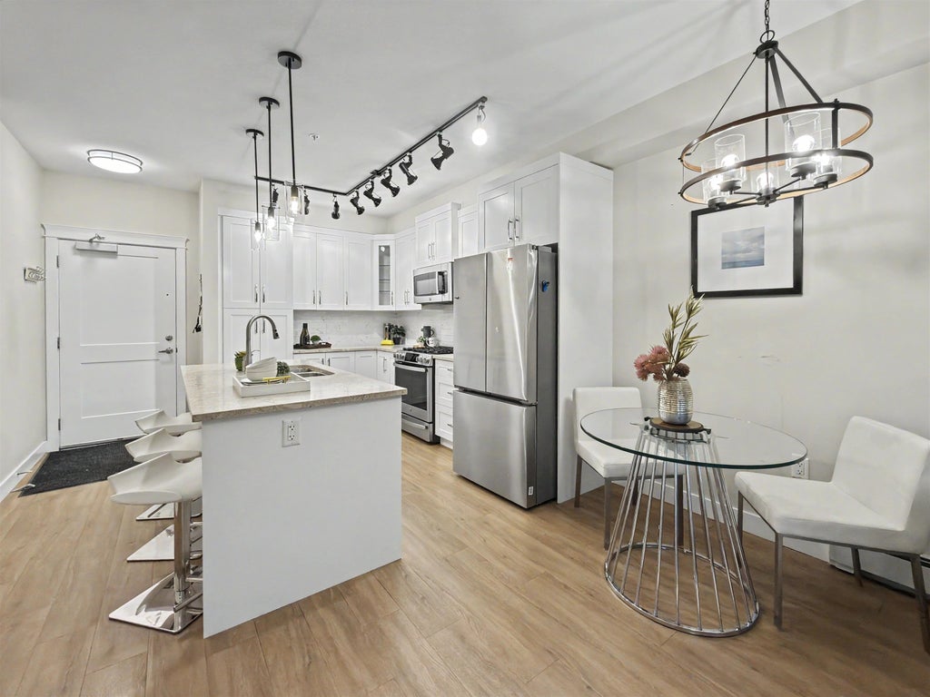 Photo of 11077 Ravine Road #515, Surrey, BC V3T 3X5 (MLS # R3160691)
