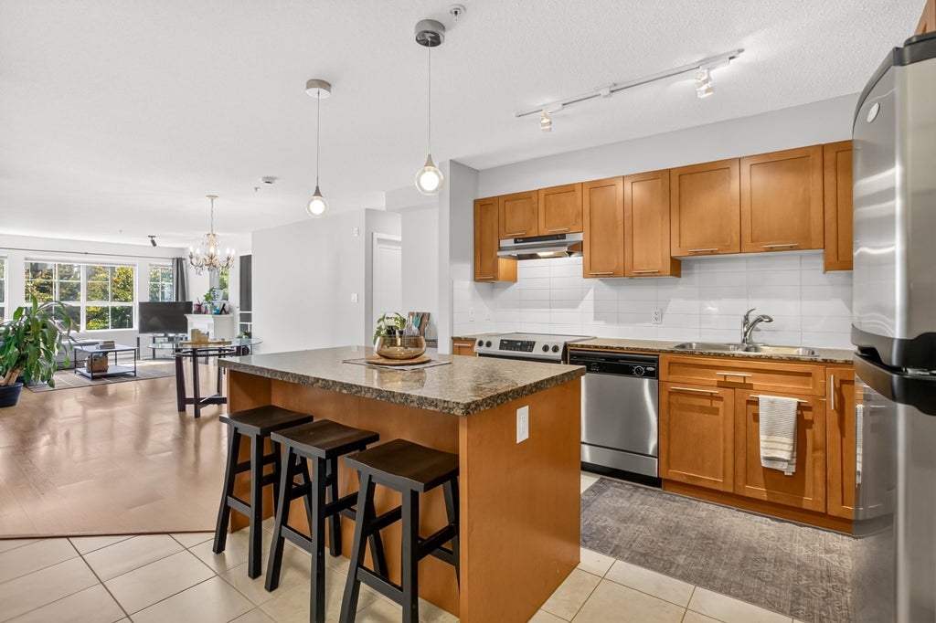 Photo of 19673 Meadow Gardens Way #234, Pitt Meadows, BC V3Y 0A1 (MLS # R3157725)