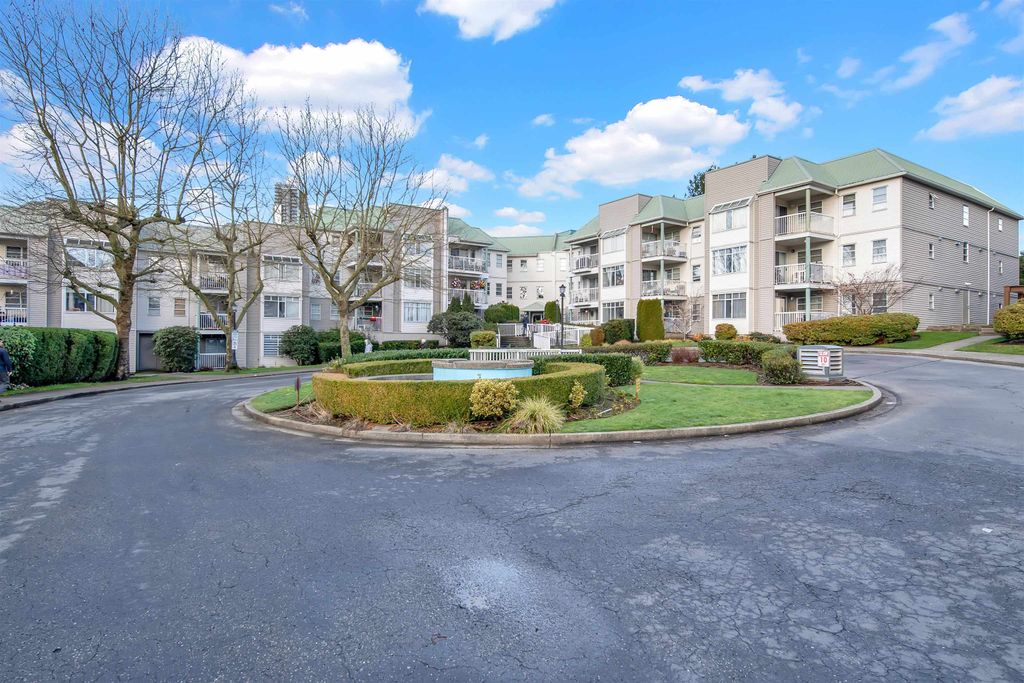 Photo of 9765 140 Street #102, Surrey, BC V3T 5S5 (MLS # R3115022)