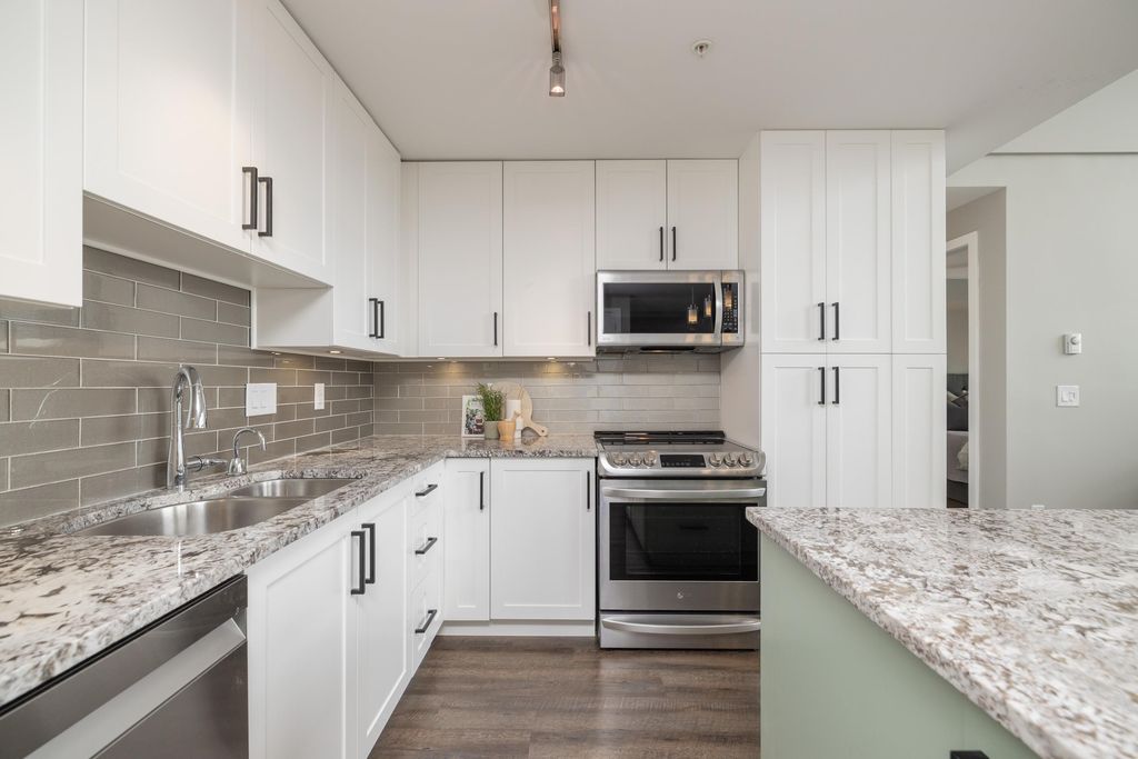 Photo of 6490 194 Street #415, Surrey, BC V4N 6J9 (MLS # R3114727)