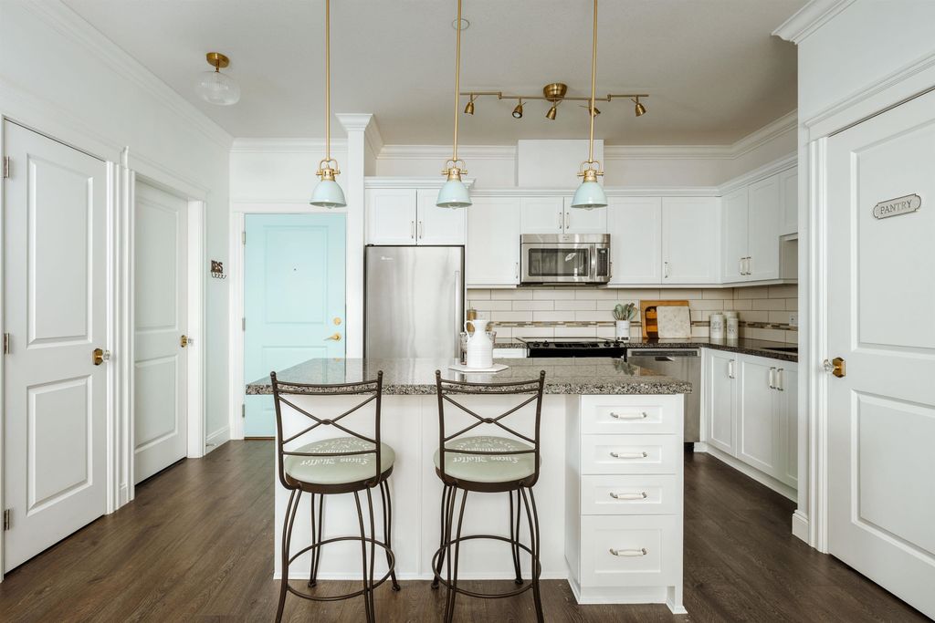 Photo of 11882 226 Street #410, Maple Ridge, BC V2X 9C7 (MLS # R3114001)