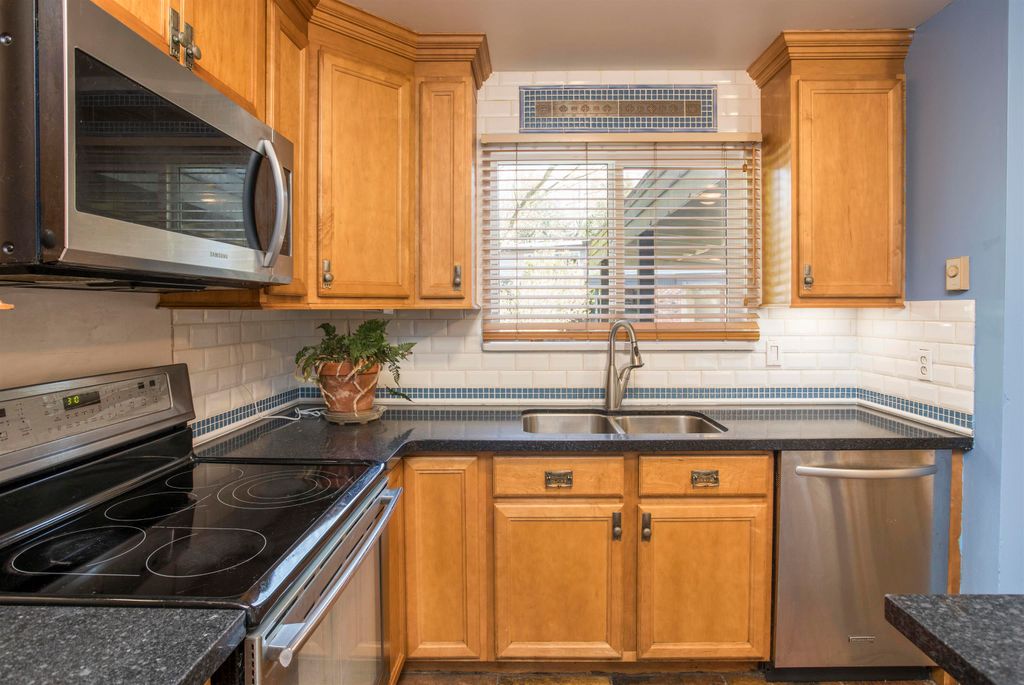 Photo of 12101 Schmidt Crescent #1, Maple Ridge, BC V2X 8A2 (MLS # R3108857)