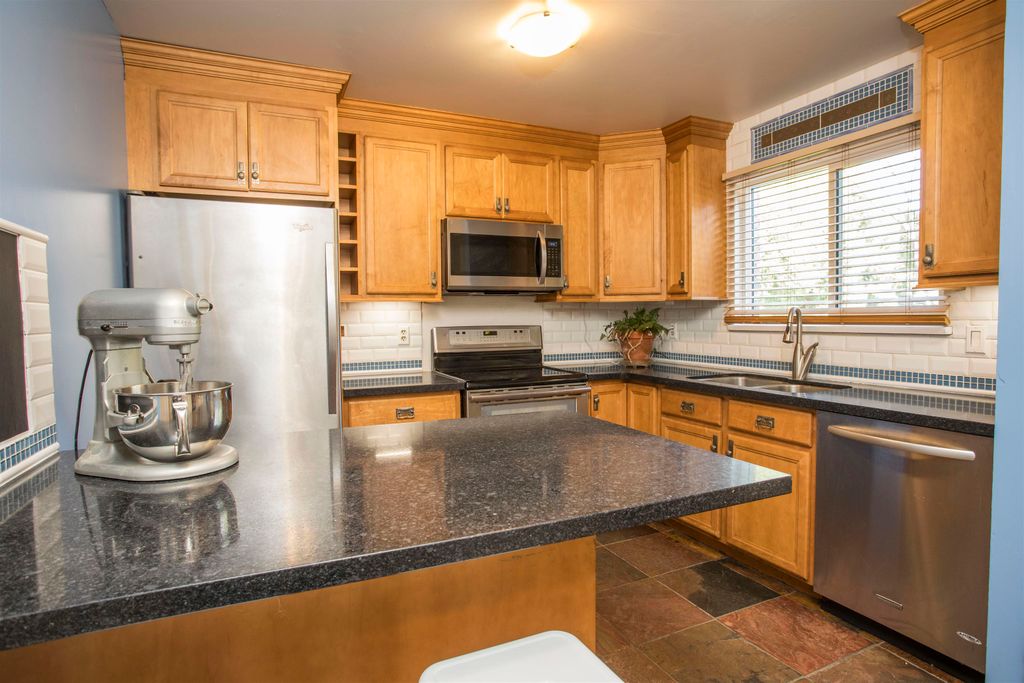 Photo of 12101 Schmidt Crescent #1, Maple Ridge, BC V2X 8A2 (MLS # R3108857)