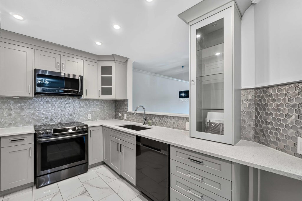 Photo of 13680 84 Avenue #404, Surrey, BC V3W 0T6 (MLS # R3153040)