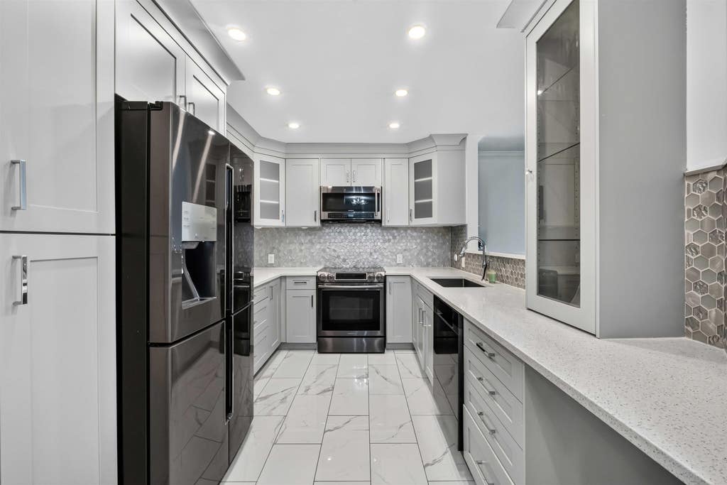 Photo of 13680 84 Avenue #404, Surrey, BC V3W 0T6 (MLS # R3153040)