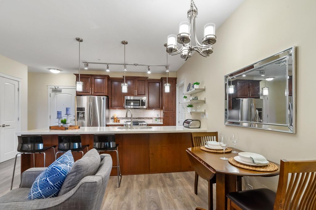 Photo of 20716 Willoughby Town Centre Drive #A512, Langley, BC V2Y 3J7 (MLS # R3076265)