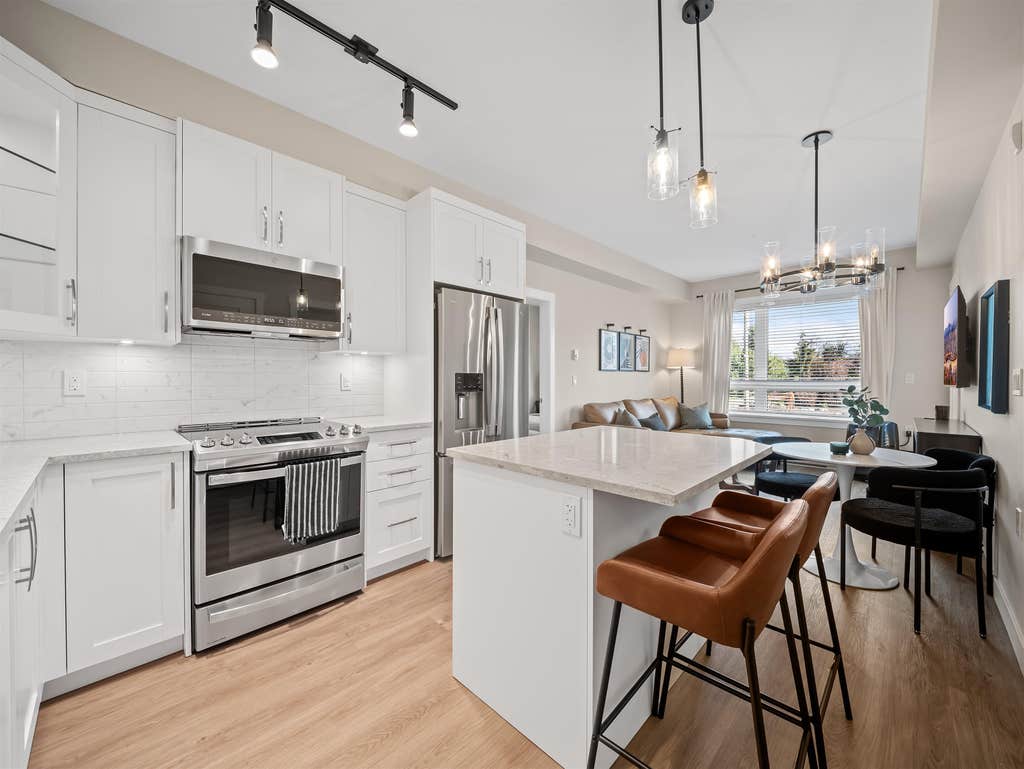 Photo of 8233 208b Street Street #A524, Langley, BC V2Y 4M7 (MLS # R3154465)