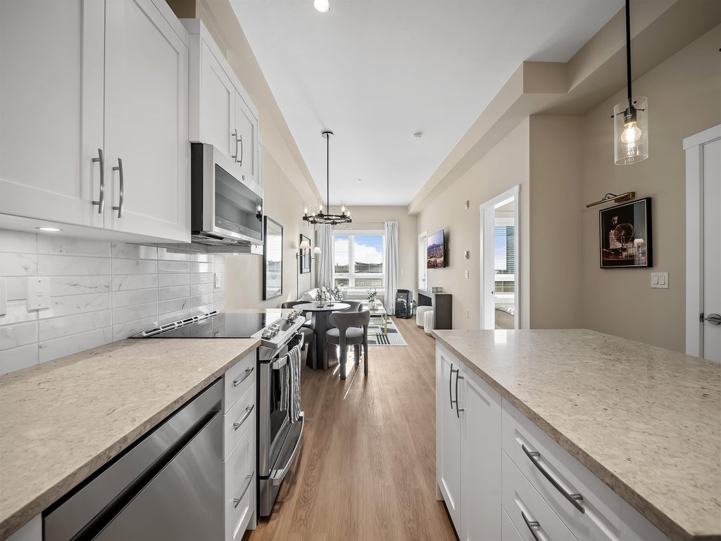 Photo of 8233 208b Street Street #A321, Langley, BC V2Y 4M7 (MLS # R3169814)