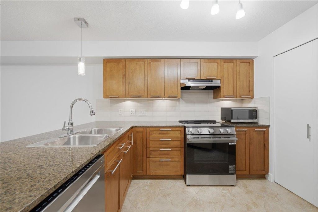 Photo of 19673 Meadow Gardens Way #103, Pitt Meadows, BC V3Y 0A1 (MLS # R3140325)