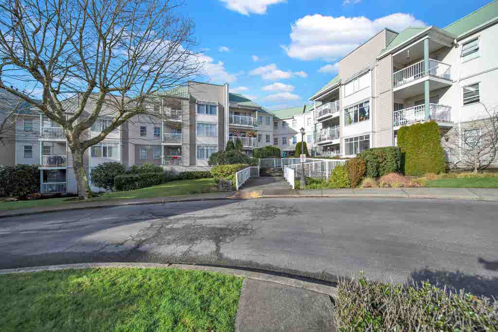 Photo of 9765 140 Street #102, Surrey, BC V3T 5S5 (MLS # R3146311)