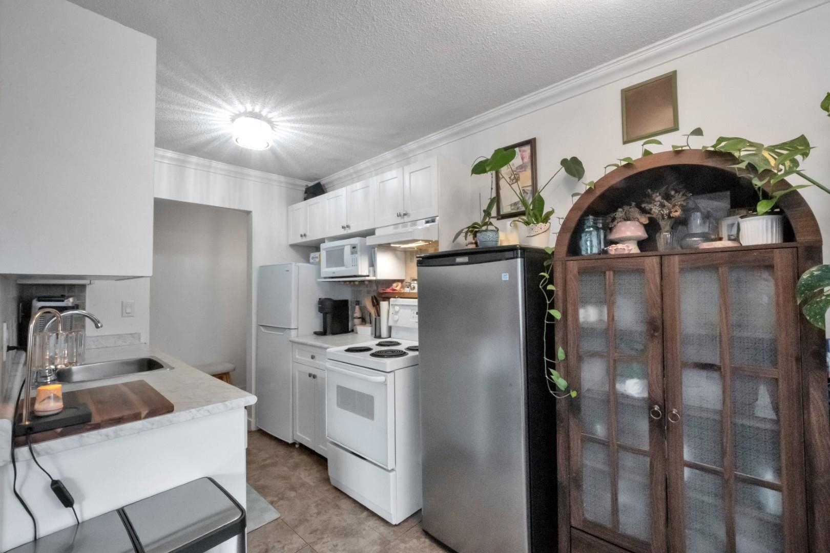 214 E 15th Street 103