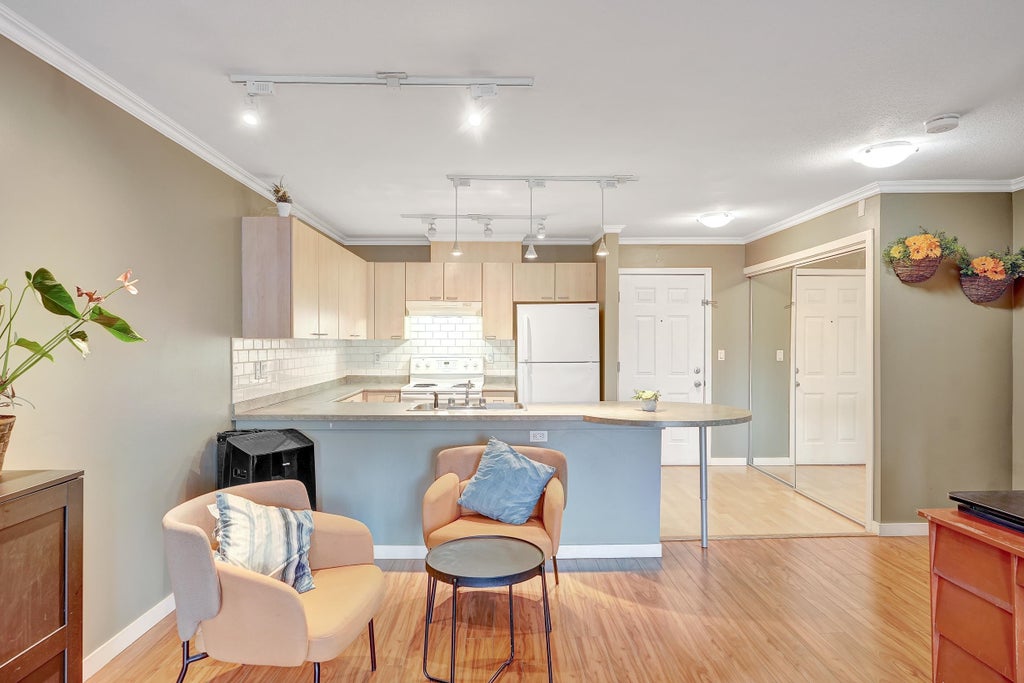 Photo of 12083 92a Avenue #304, Surrey, BC V3V 8C8 (MLS # R3149211)