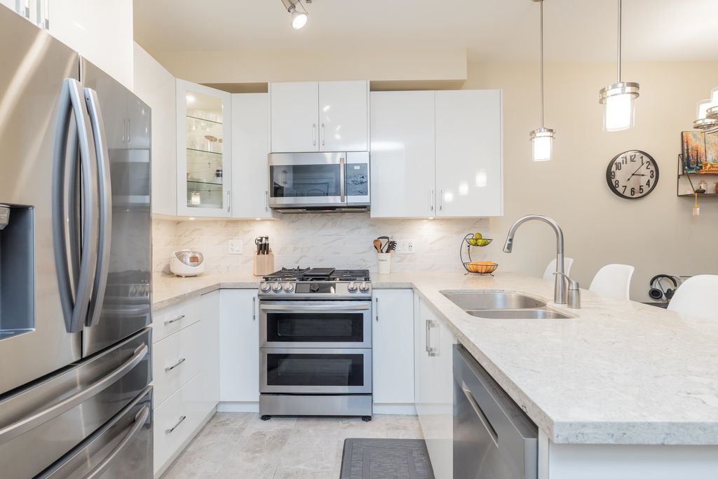 Photo of 8538 203a Street #111, Langley, BC V2Y 3P9 (MLS # R3115091)