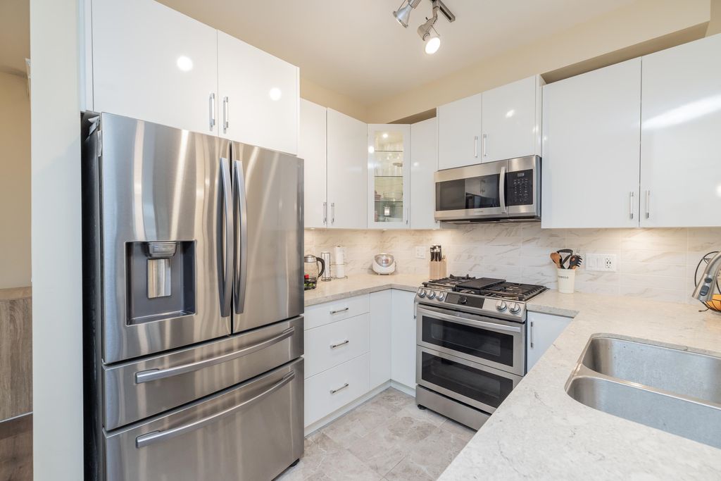 Photo of 8538 203a Street #111, Langley, BC V2Y 3P9 (MLS # R3115091)