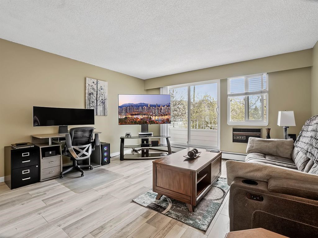 Photo of 12096 222 Street #207, Maple Ridge, BC V2X 5W1 (MLS # R3111671)