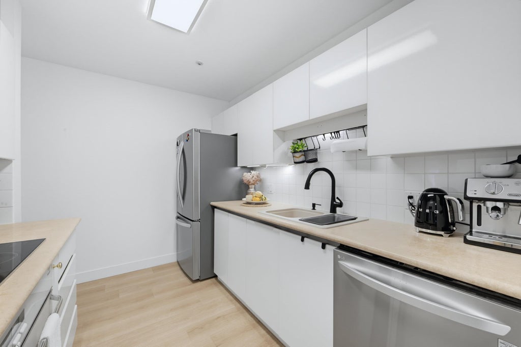 Photo of 15375 17 Avenue #203, Surrey, BC V4A 1T8 (MLS # R3166075)