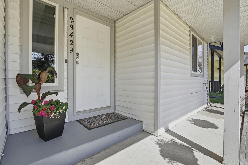 Photo of 23429 Sandpiper Avenue, Maple Ridge, BC V2X 9M4 (MLS # R3107818)