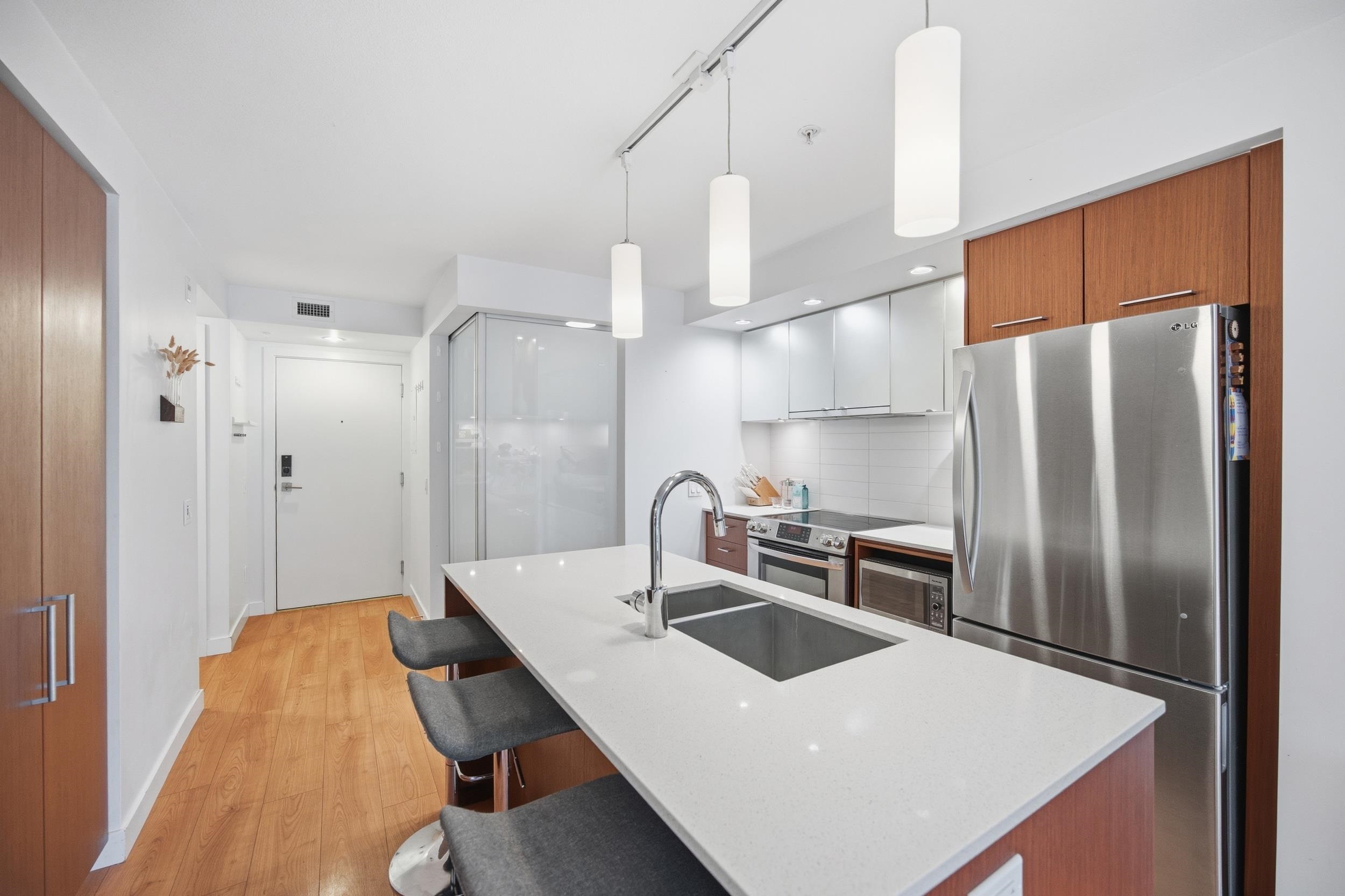 221 E 3rd Street 209