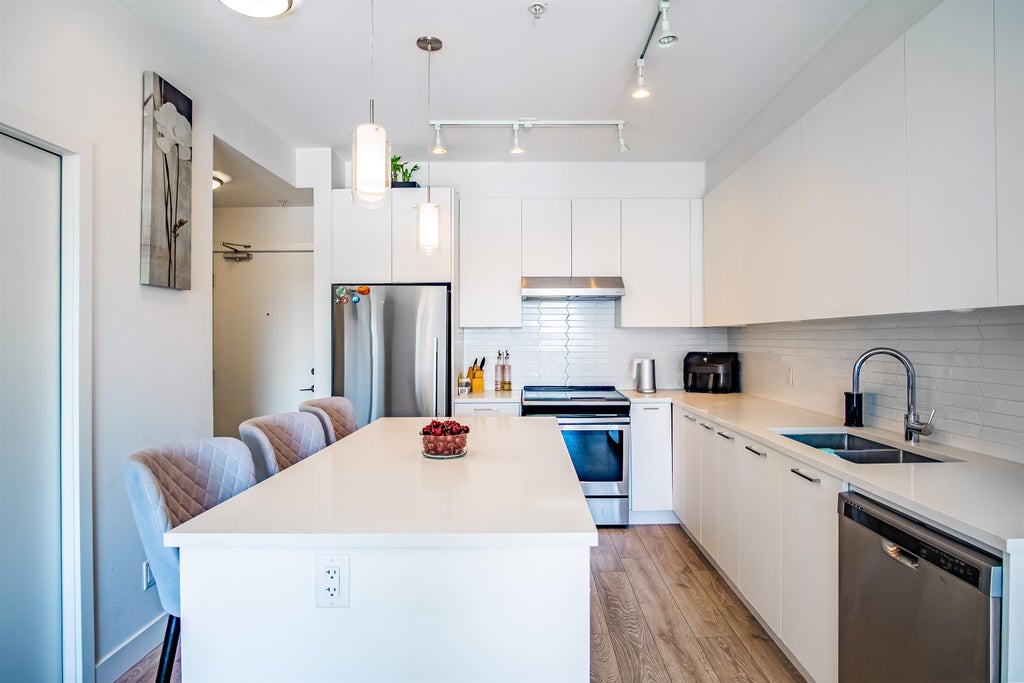 Photo of 7809 209 Street #312, Langley, BC V2Y 3N6 (MLS # R3163692)
