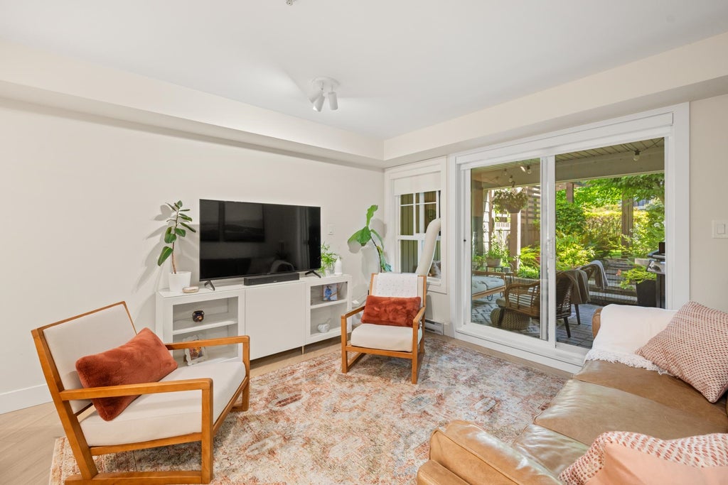 Photo of 19673 Meadow Gardens Way #104, Pitt Meadows, BC V3Y 0A1 (MLS # R3152047)