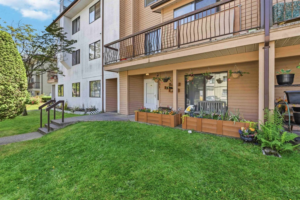 Photo of 7139 133a Street #103, Surrey, BC V3W 8A1 (MLS # R3130428)