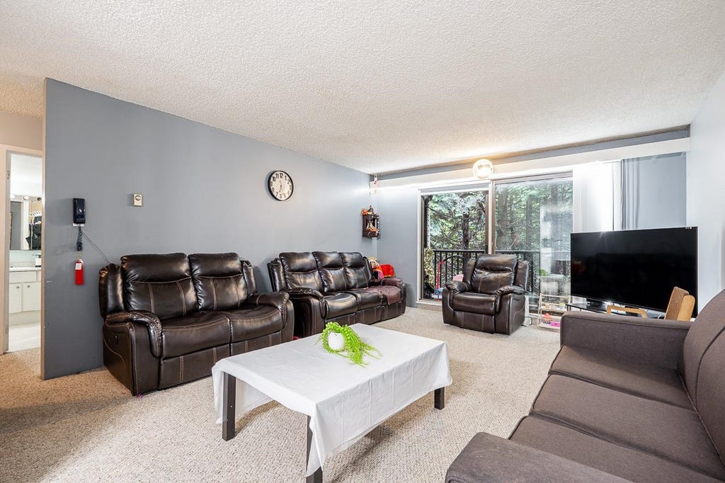 Photo of 15238 100 Avenue #209, Surrey, BC V3R 7T9 (MLS # R3157115)