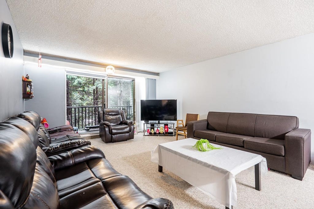 Photo of 15238 100 Avenue #209, Surrey, BC V3R 7T9 (MLS # R3157115)