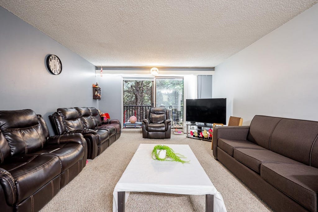 Photo of 15238 100 Avenue #209, Surrey, BC V3R 7T9 (MLS # R3157115)