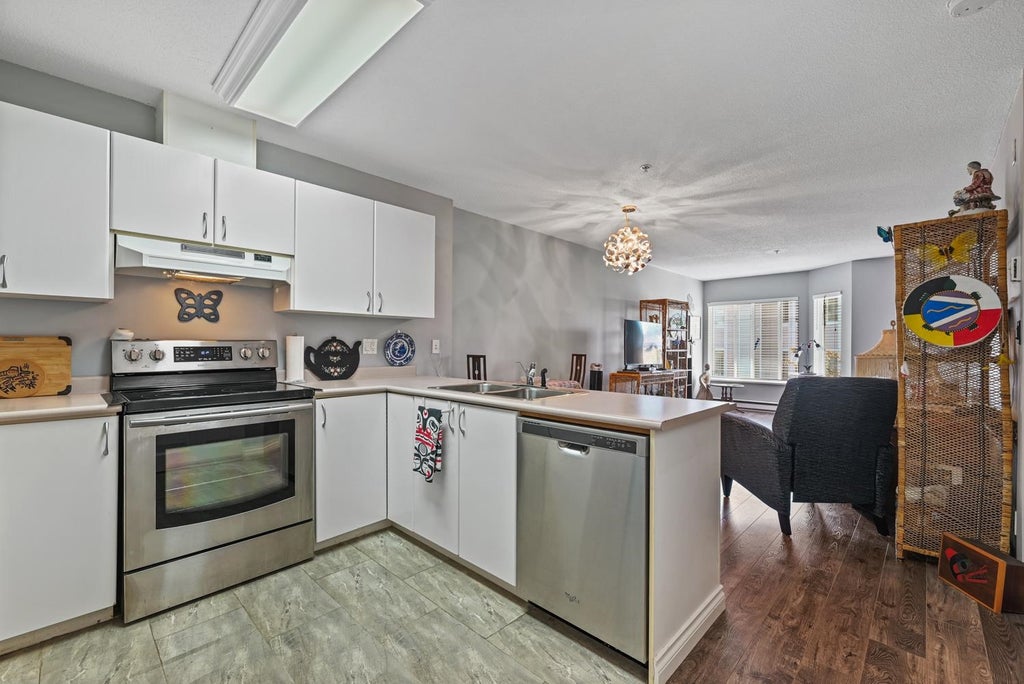 Photo of 12160 80 Avenue #211, Surrey, BC V3W 0V3 (MLS # R3158305)