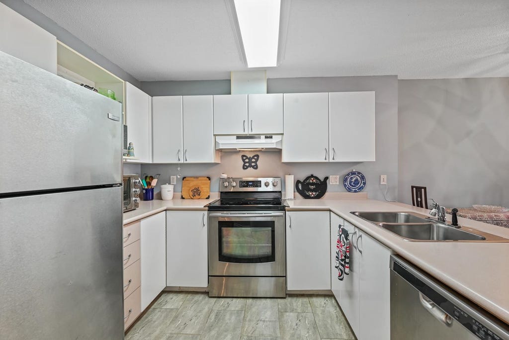 Photo of 12160 80 Avenue #211, Surrey, BC V3W 0V3 (MLS # R3158305)