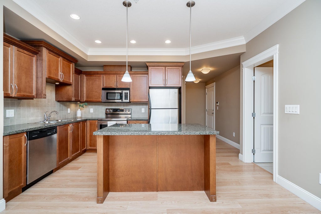 Photo of 22150 Dewdney Trunk Road #301, Maple Ridge, BC V2X 3H6 (MLS # R3171710)