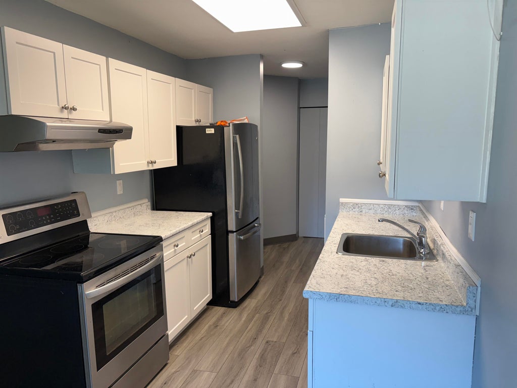 Photo of 9682 134 Street #206, Surrey, BC V3T 5L6 (MLS # R3138970)