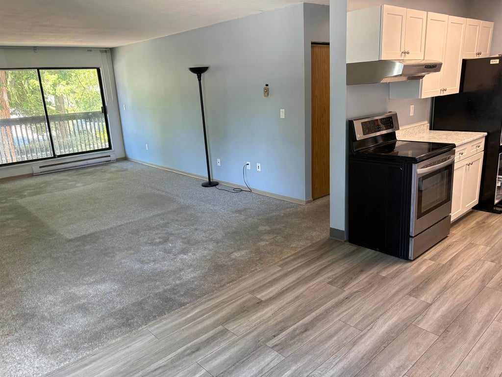 Photo of 9682 134 Street #206, Surrey, BC V3T 5L6 (MLS # R3138970)