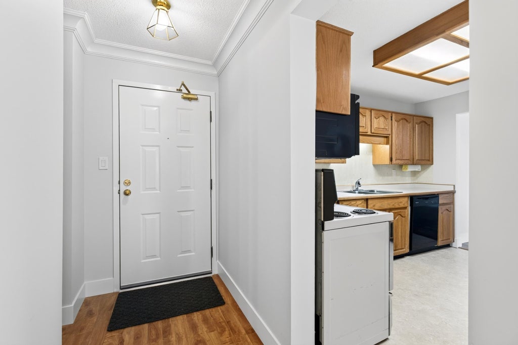 Photo of 32833 Landeau Place #311, Abbotsford, BC V2S 6S6 (MLS # R3145555)