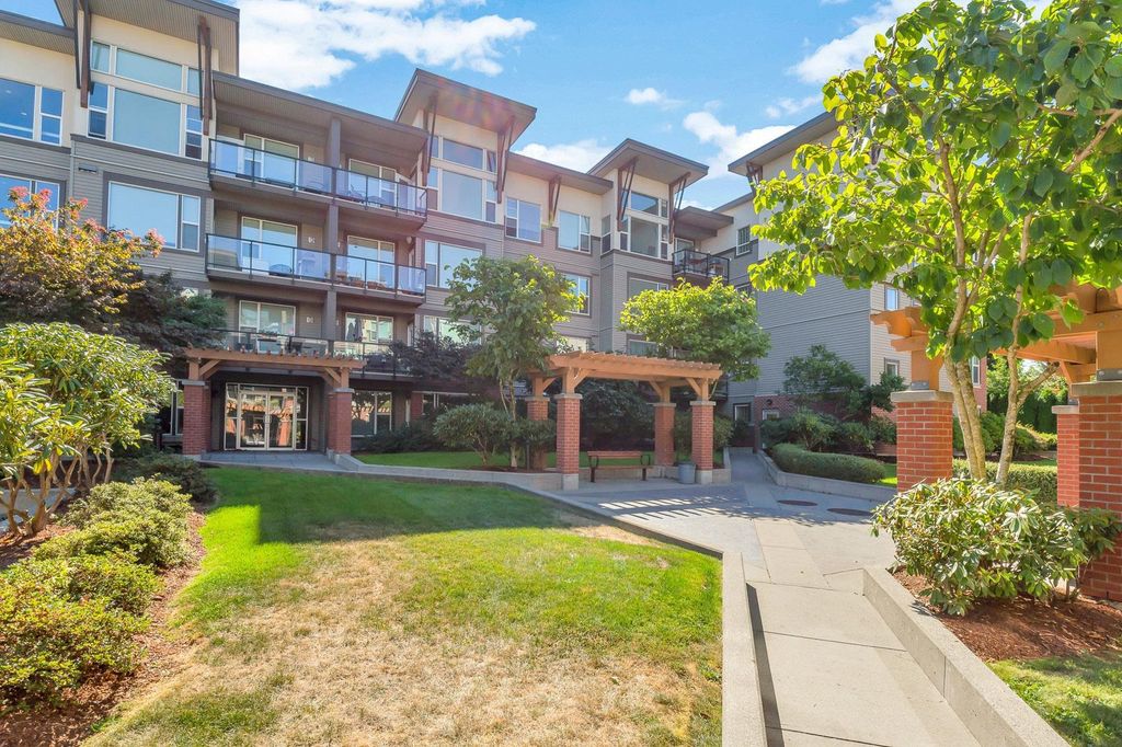 Photo of 33539 Holland Avenue #109, Abbotsford, BC V2S 0C6 (MLS # R3110325)