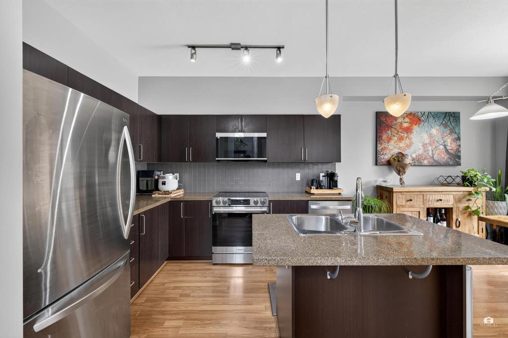 Photo of 6575 192 Street #102, Surrey, BC V4N 5T8 (MLS # R3148506)