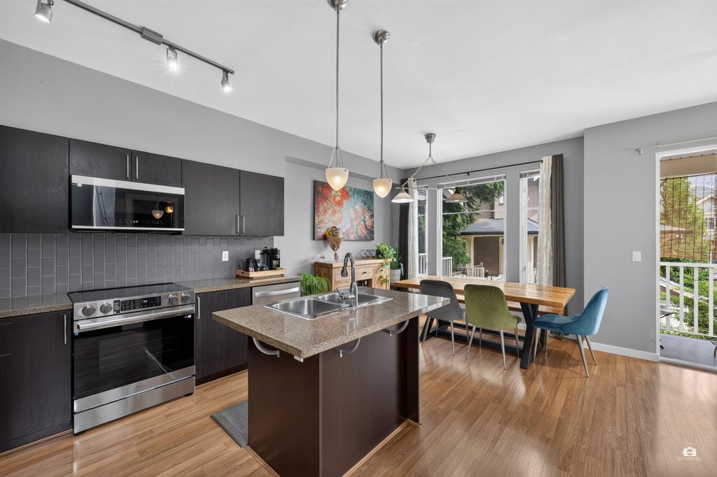 Photo of 6575 192 Street #102, Surrey, BC V4N 5T8 (MLS # R3148506)