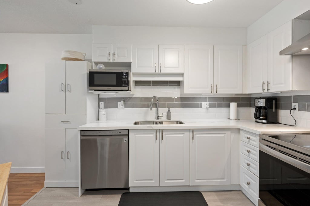 Photo of 5765 Glover Road #202, Langley, BC V3A 8M8 (MLS # R3158124)