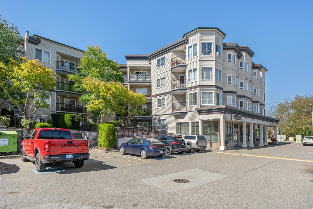 Photo of 5765 Glover Road #202, Langley, BC V3A 8M8 (MLS # R3158124)