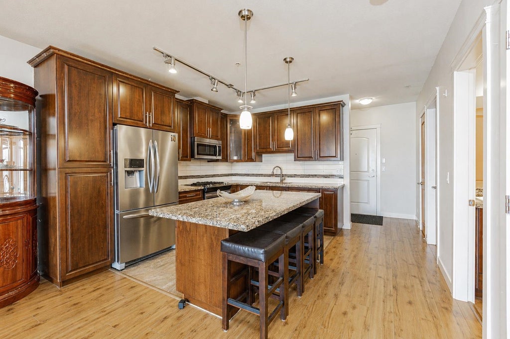 Photo of 8067 207 Street #405, Langley, BC V2Y 0N9 (MLS # R3170811)