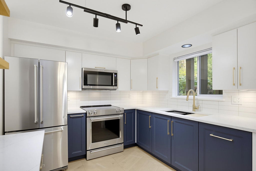 Photo of 20556 113 Avenue #105, Maple Ridge, BC V2X 1Z2 (MLS # R3171068)