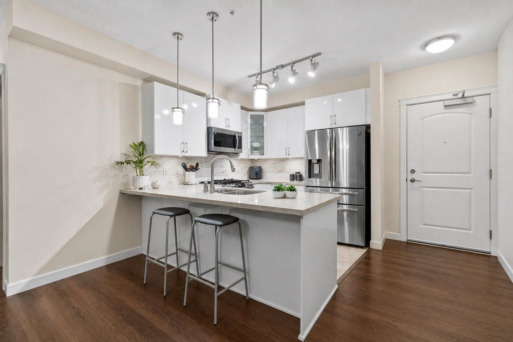 Photo of 20376 86 Avenue #208, Langley, BC V2Y 3P8 (MLS # R3126273)