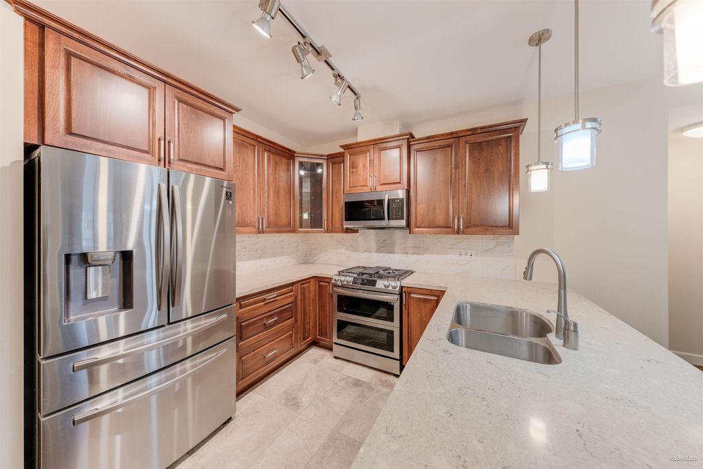 Photo of 20325 85 Avenue #208, Langley, BC V3Y 2C2 (MLS # R3125323)