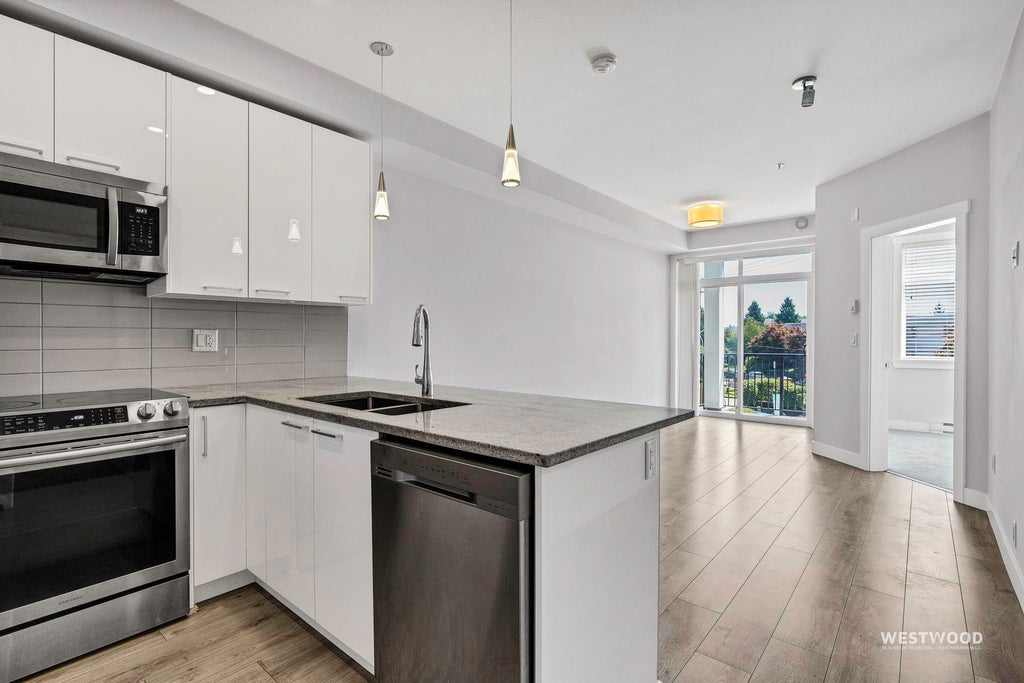 Photo of 20696 Eastleigh Crescent #210, Langley, BC V3A 0M3 (MLS # R3144228)