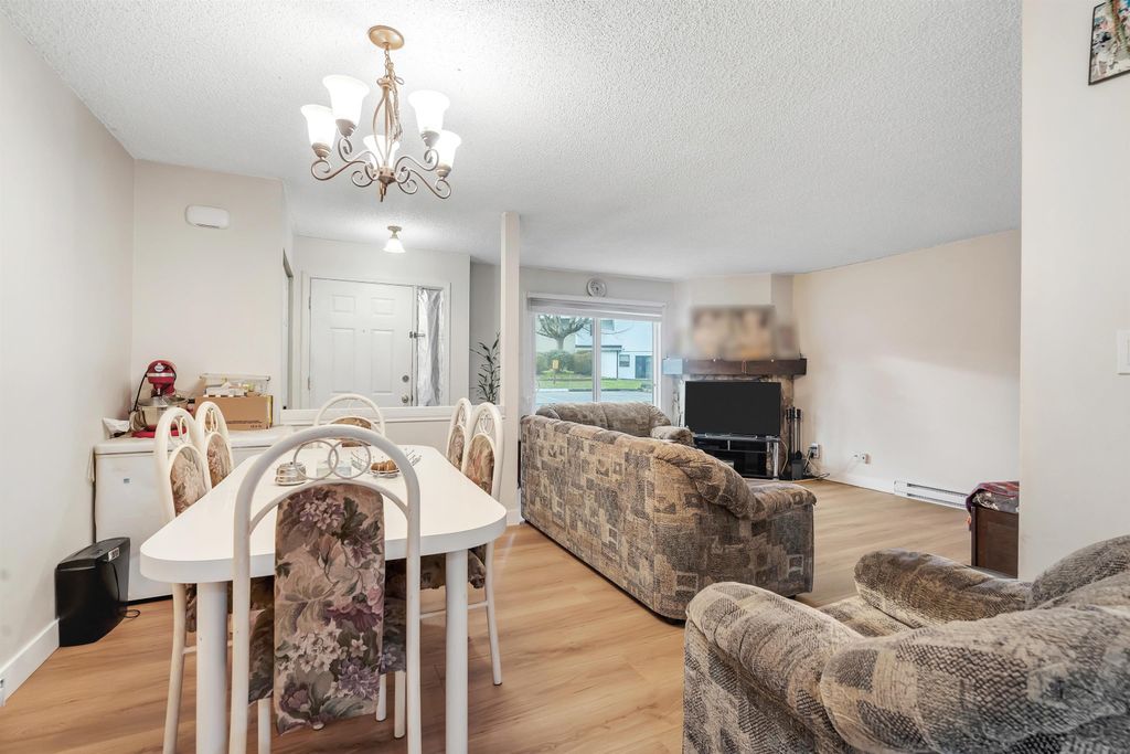 Photo of 7116 133b Street #105, Surrey, BC V3W 8A4 (MLS # R3089403)