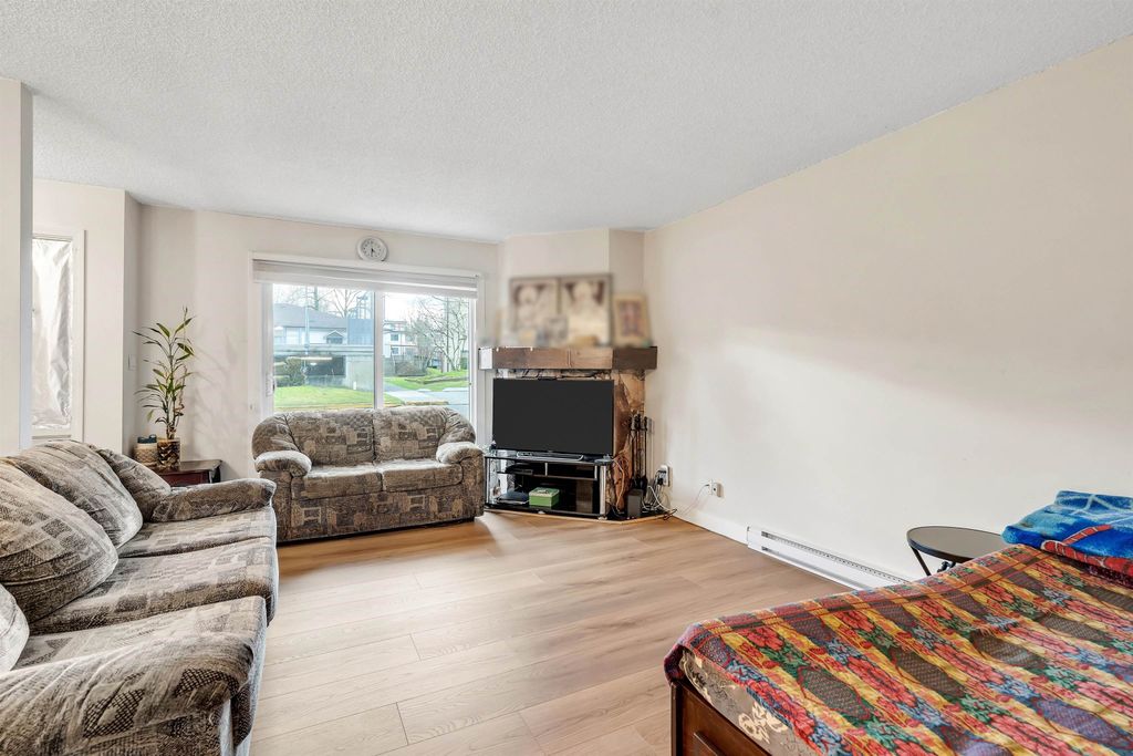 Photo of 7116 133b Street #105, Surrey, BC V3W 8A4 (MLS # R3089403)