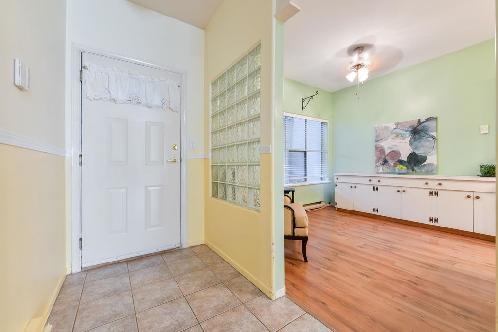 Photo of 20680 56 Avenue #103, Langley, BC V3A 3Z1 (MLS # R3149799)